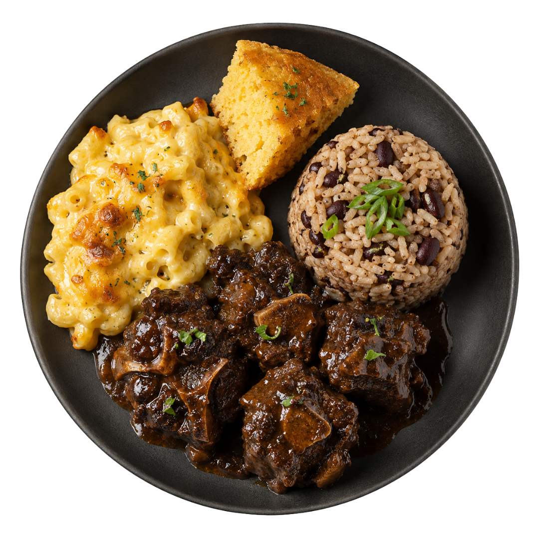 Slow-braised oxtail plate with mac and cheese, cornbread, and rice and peas